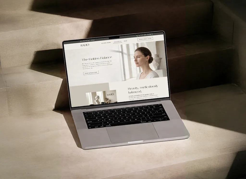 Ratio aesthetic clinic website concept presented on a laptop