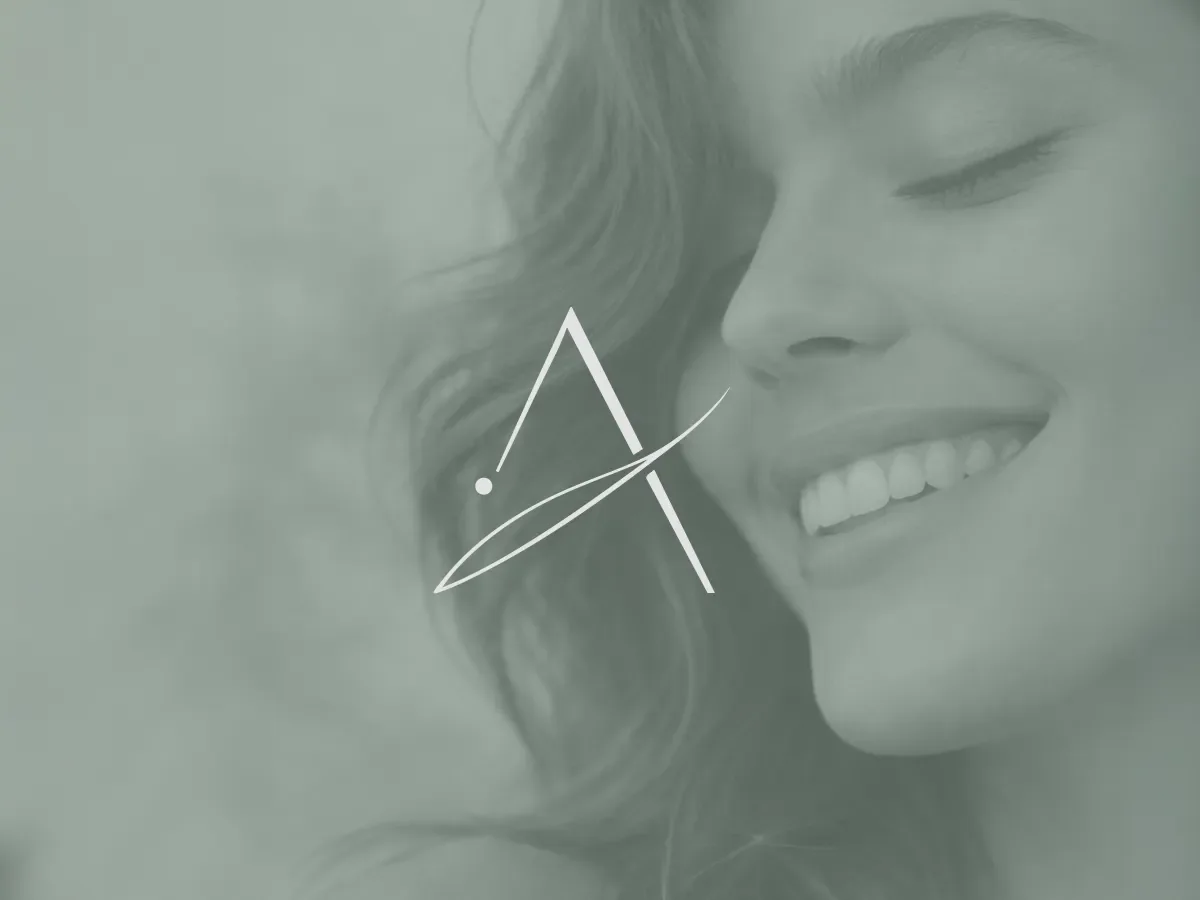 Aura Studio A symbol over a portrait photograph