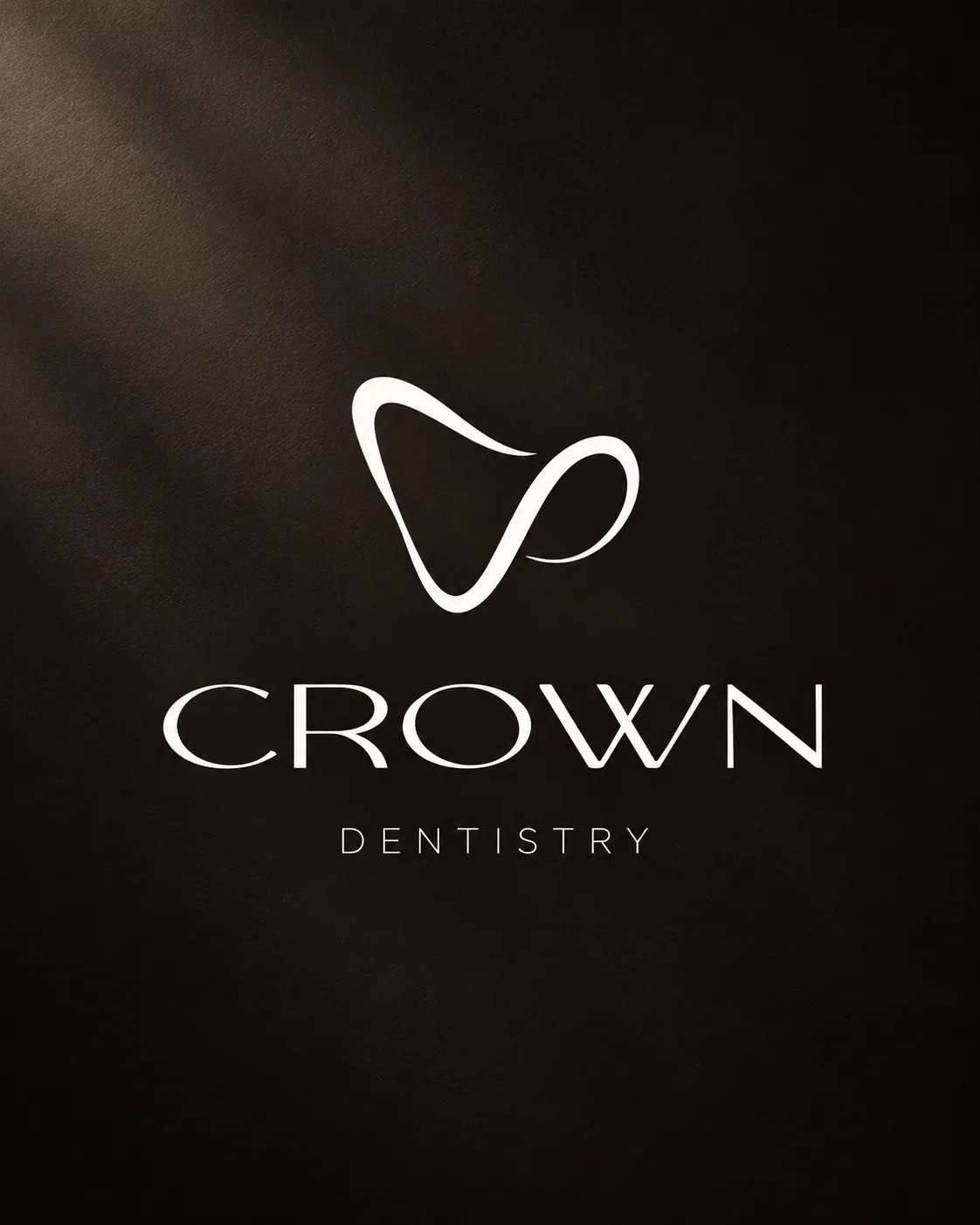 Crown Dentistry logo on a textured dark background