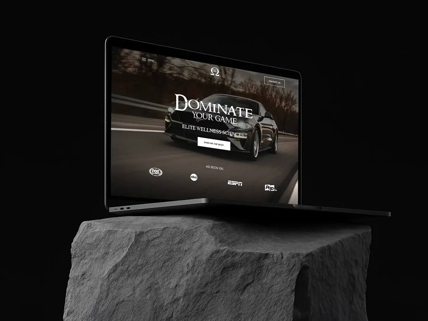 Omega dark luxury website design displayed in a laptop presentation mockup