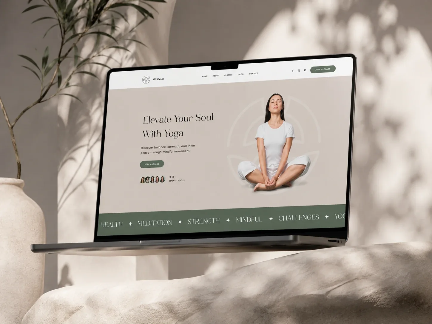 SoulNest yoga website template displayed on a laptop with earthy green and neutral tones